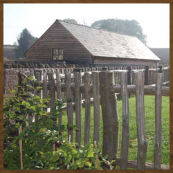 Wooden fencing around a horse stable